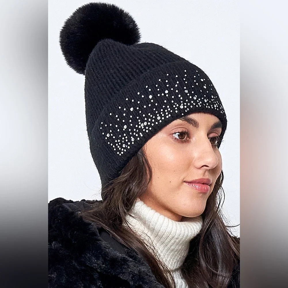Madden NYC women’s beanie hat with decorative trim and pom-pom. Excellent condi